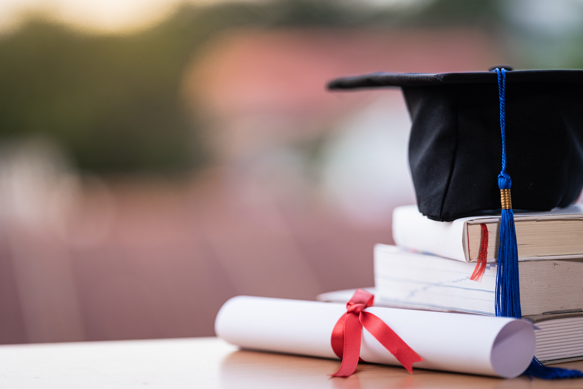 University Graduation Hat and Diploma